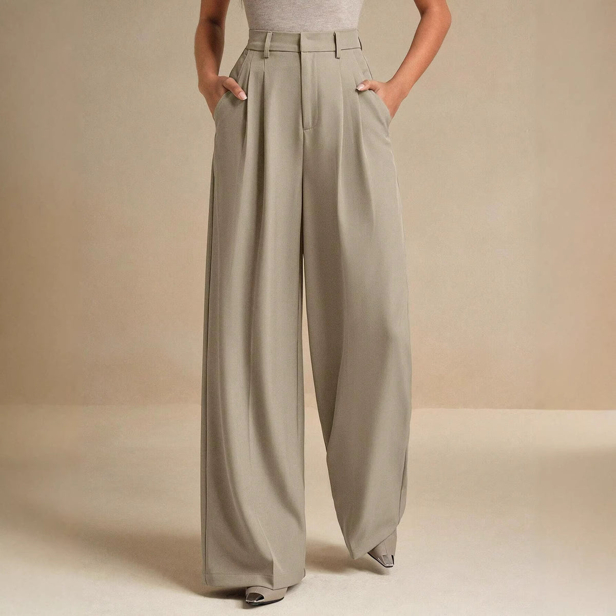 Atelier trousers showing the relaxed straight leg and clean zip-fly front