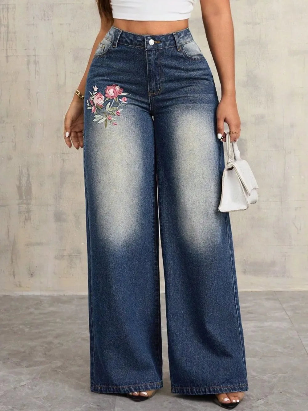 Delphine embroidered wide-leg jeans by Belle Soié — cotton blend denim with embroidered leg detail