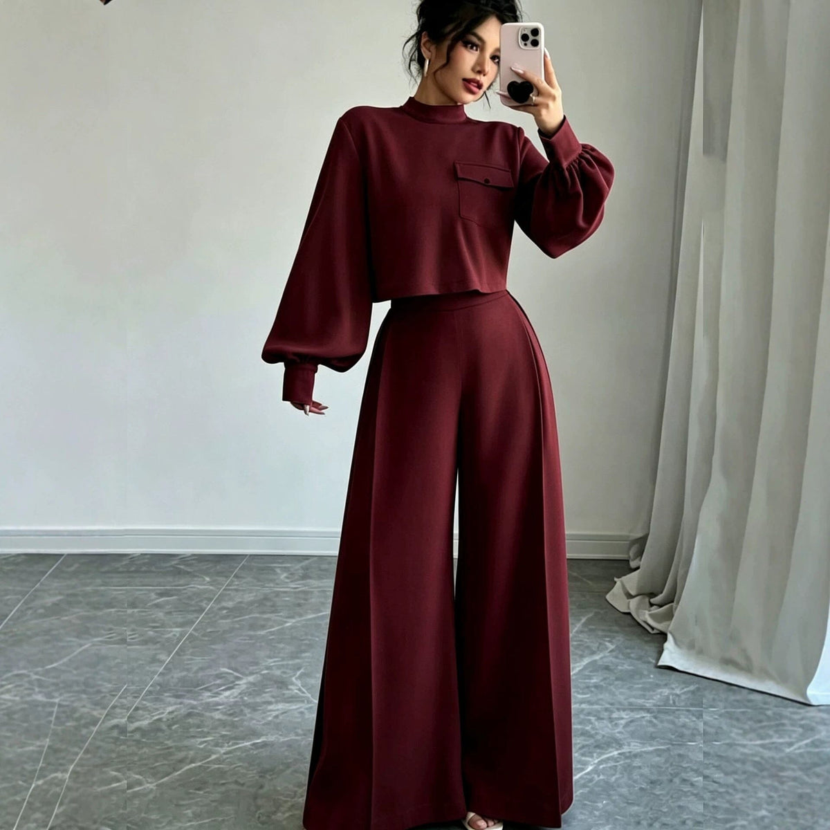 Céline co-ord set showing the wide-leg trouser and fitted long sleeve top worn together